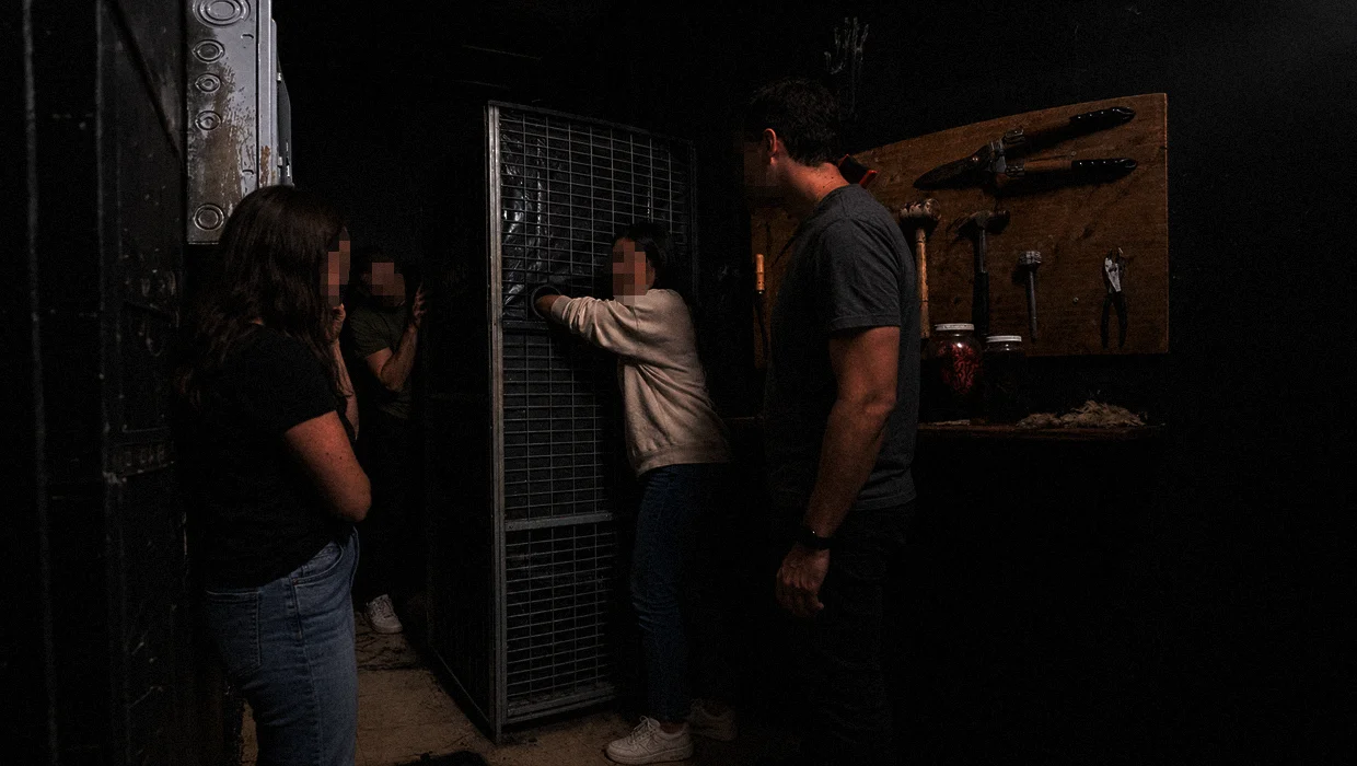 The atmospheric interior of The Basement escape room in Los Angeles — cinematic, unsettling, and completely immersive